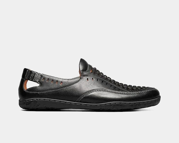 A black woven vamp moc toe slip-on shoe with a lightweight sole.