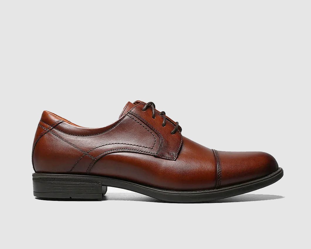 A cognac leather Oxford shoe with a cap toe style and lace-up closure.