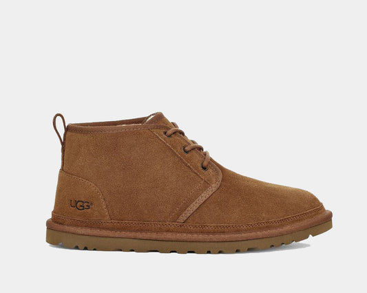 A brown suede chukka boot with lace-up closure and the UGG brand logo visible.