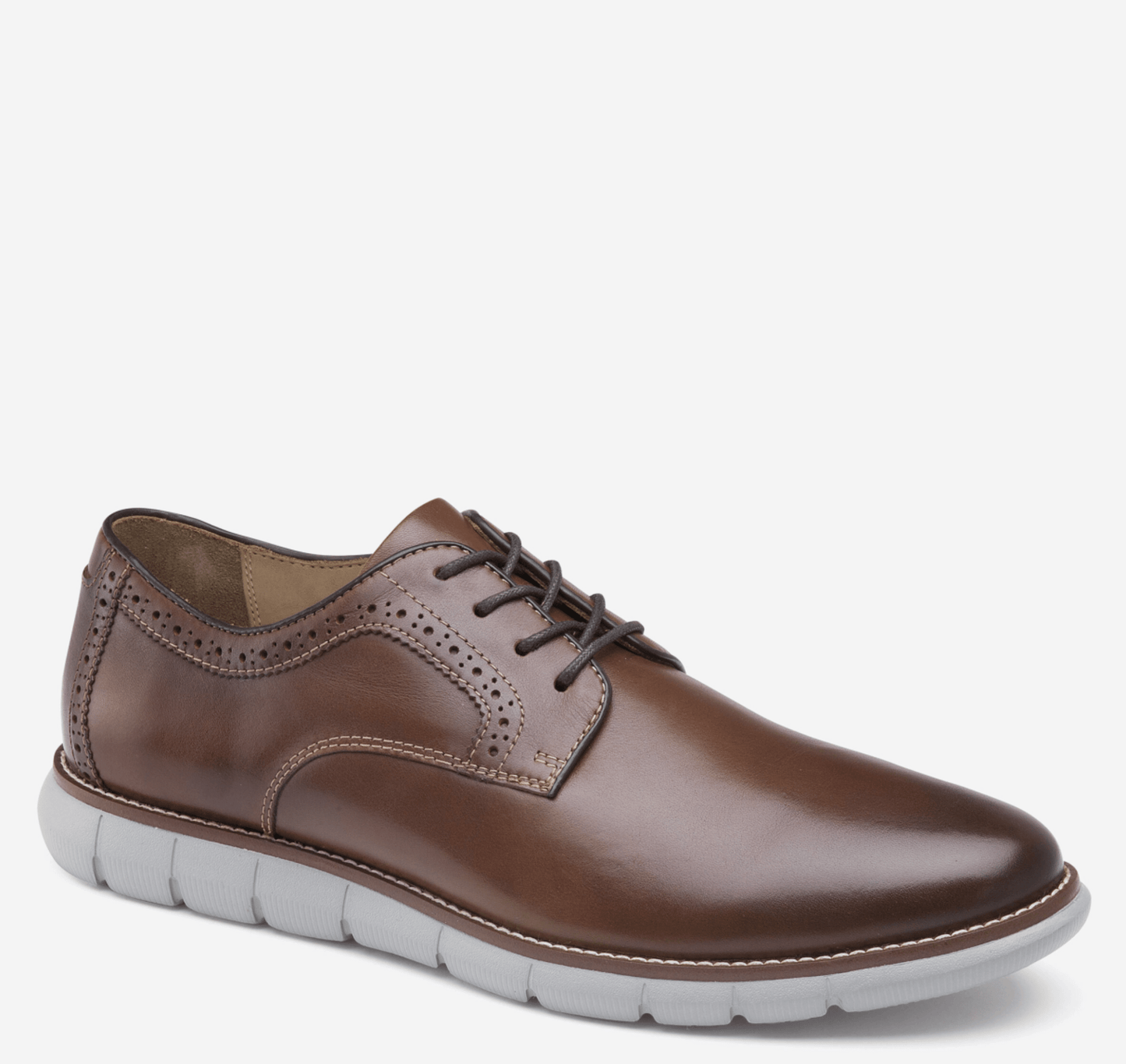 A mahogany, leather Oxford shoe with a rubber sole, featuring a lace-up closure and a brogue detail on the toe.
