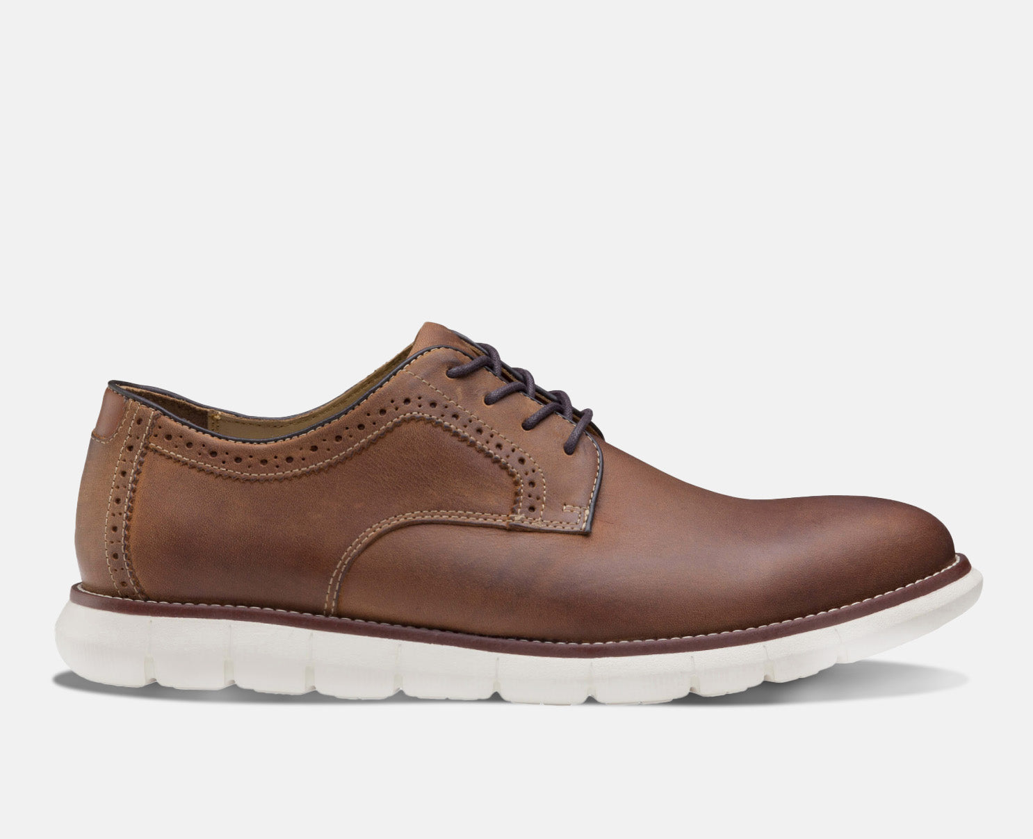 A brown, leather Oxford shoe with a rubber sole, featuring a lace-up closure and a brogue detail on the toe.