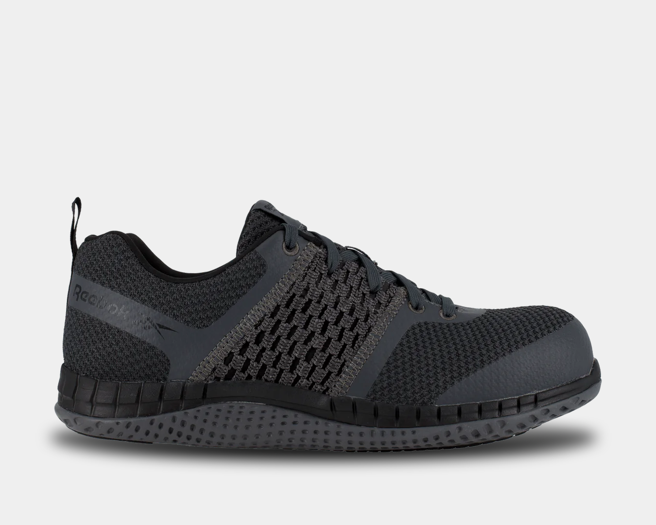 A black work shoe with a composite toe, featuring an Ultraknit upper and a rubber outsole with traction lugs.