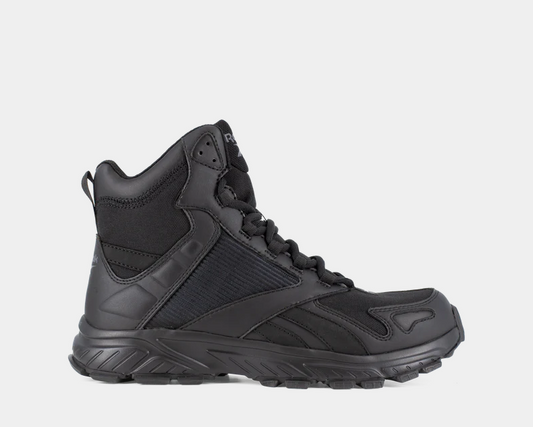 A black tactical trail running boot, designed for stable footing and comfort on rugged terrain.