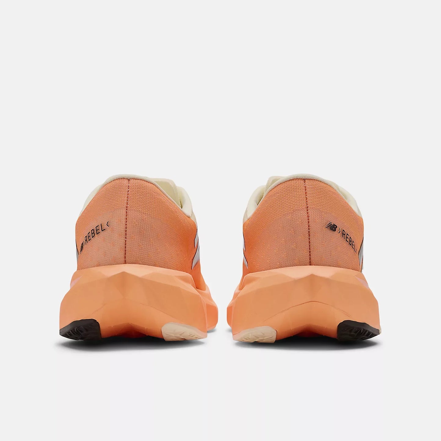 New Balance Women's Fuel Cell Rebel v4 - Hot Mango/Angora/Black